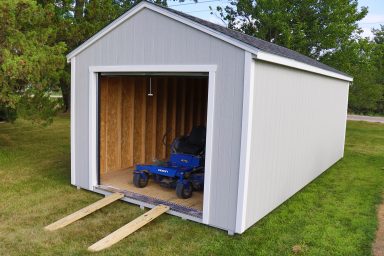 portable garage with a ramp